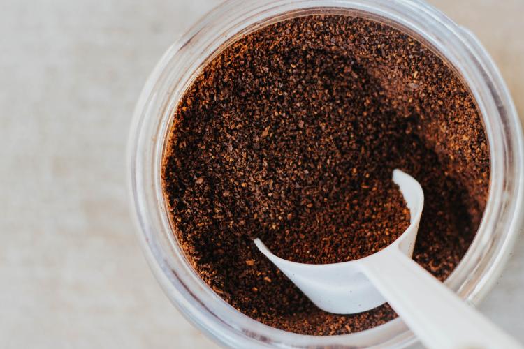 A jar with coffee grounds fresh