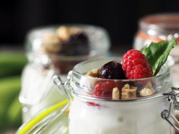 milk based kefir with berries in jars