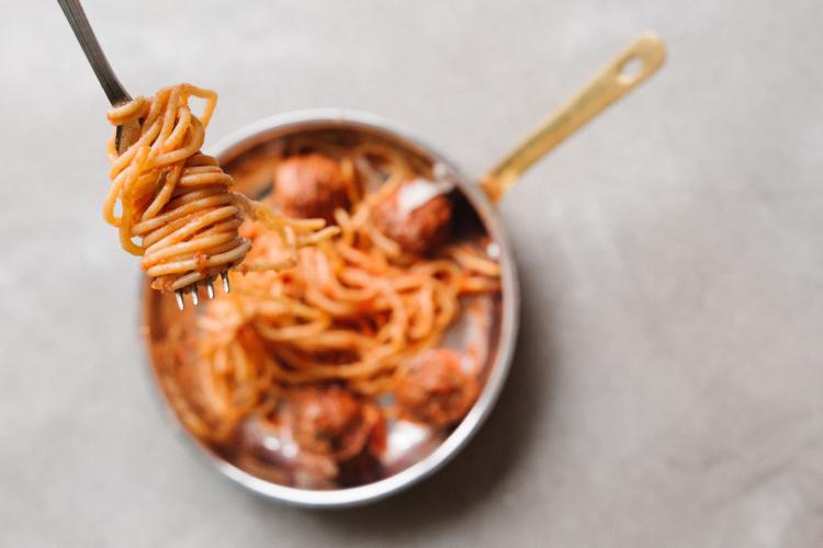 a fork with bolognese a fork with bolognese