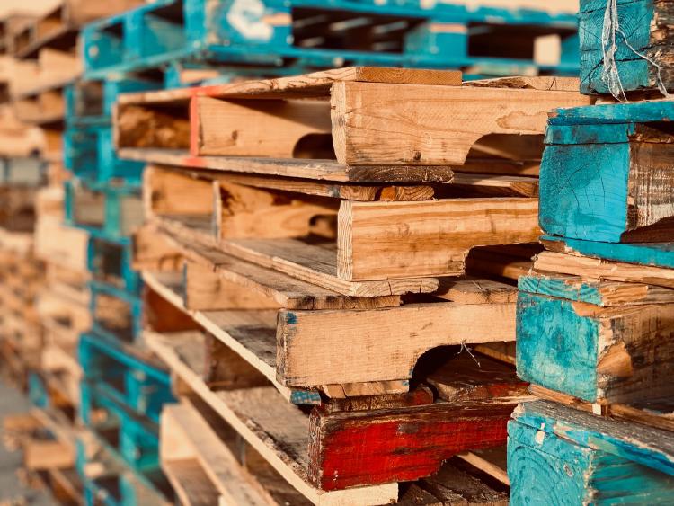 Pile of pallets of different colors