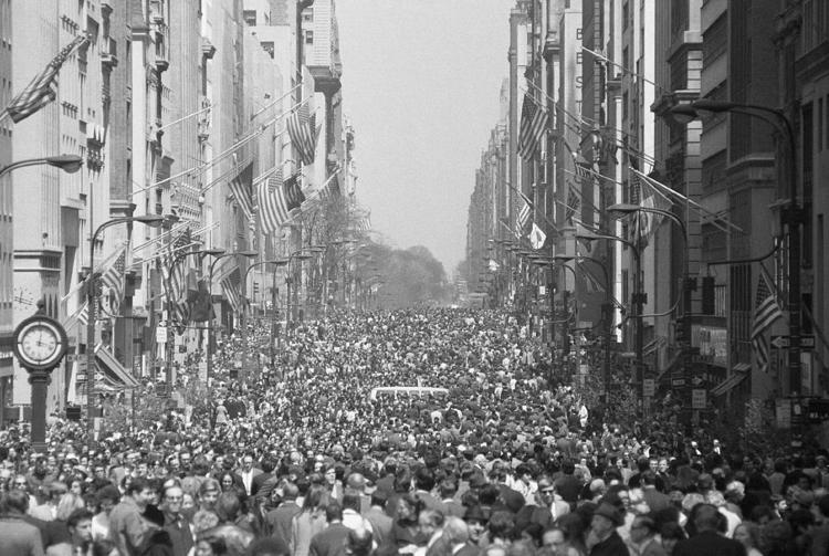 1970 a street filled with people 1970 a street filled with people