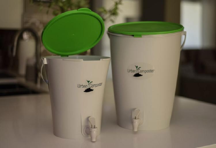 4a green lid bins on a sink