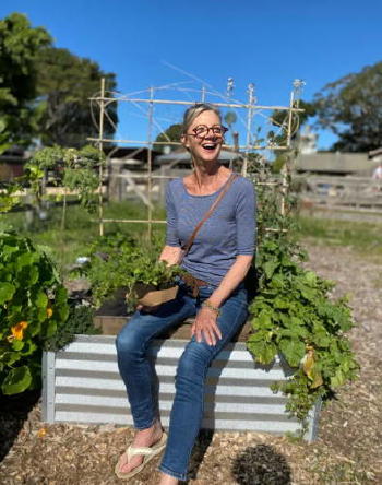 woman sitting on composter woman sitting on composter